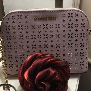 BNWT Small Pink Micheal kors perforated Handbag.